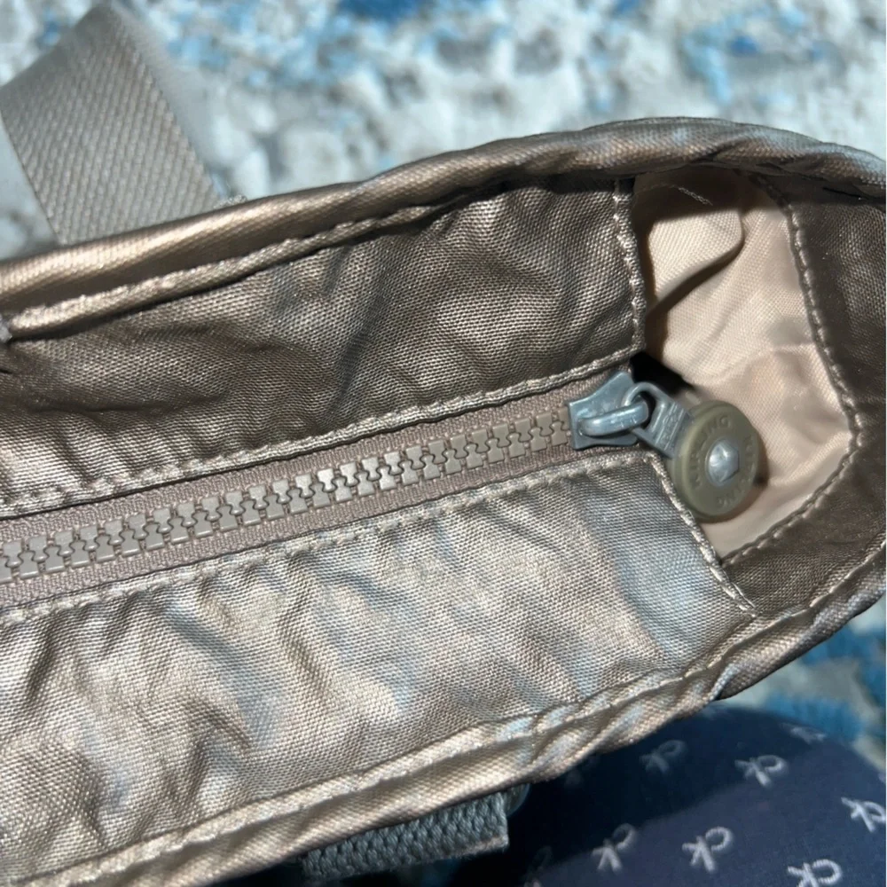 Kipling Angela medium shoulder bag Stylish Metallic with furry monkey Mary